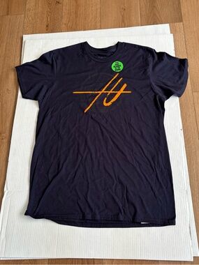 SHOP DISNEY OFFICIAL TOMORROWLAND MOVIE LOGO GLOW IN THE DARK T SHIRT LARGE